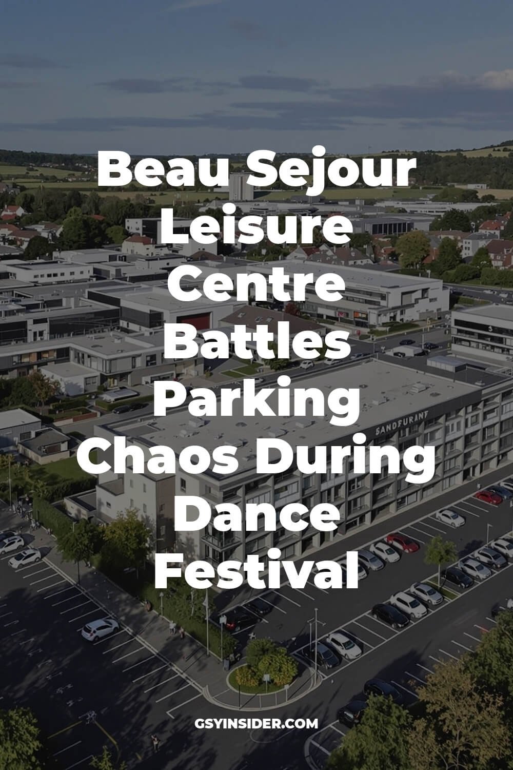 "Aerial view of Beau Sejour Leisure Centre during festival, showing overcrowded parking lots, irregular parking on grass, and queues on access roads."